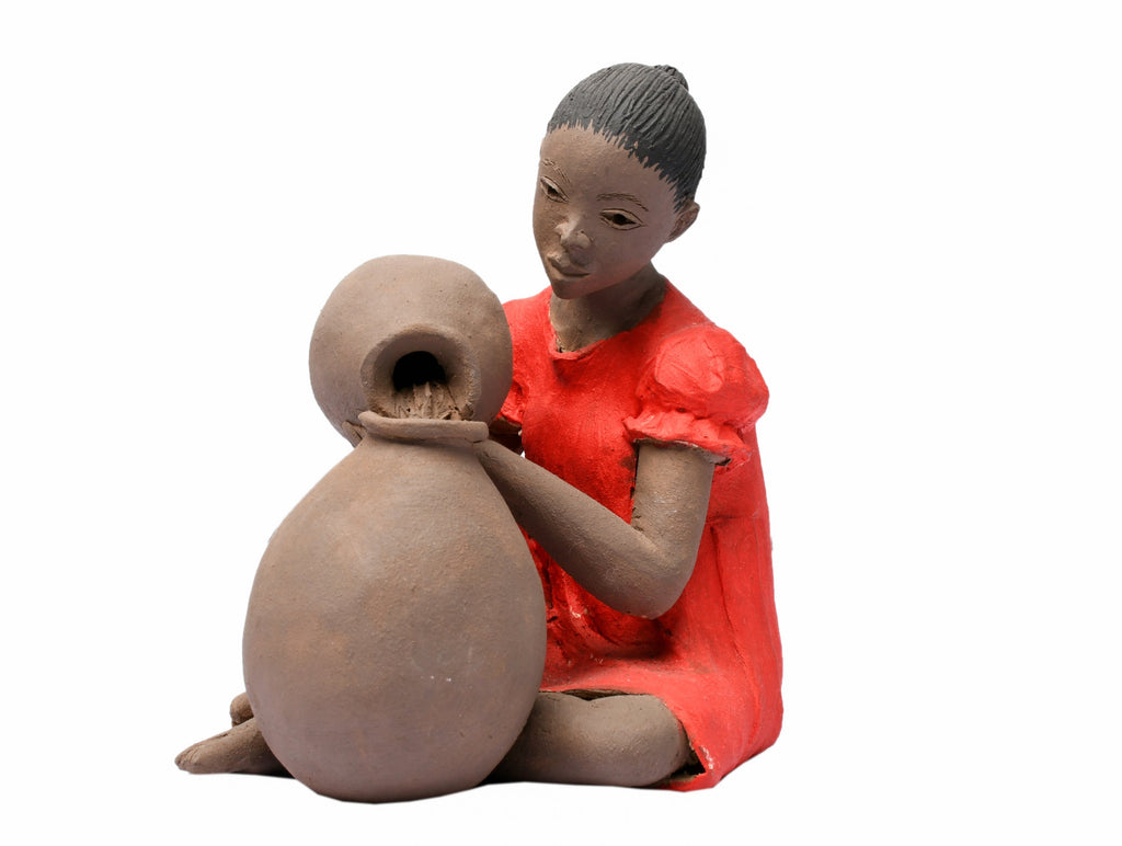 TERRACOTTA GIRL TURNING FROM POT BY REUBEN UGBINE